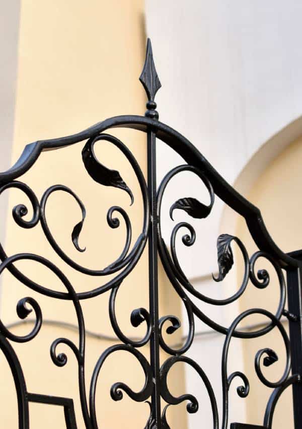 Ornate wrought iron gate detail.