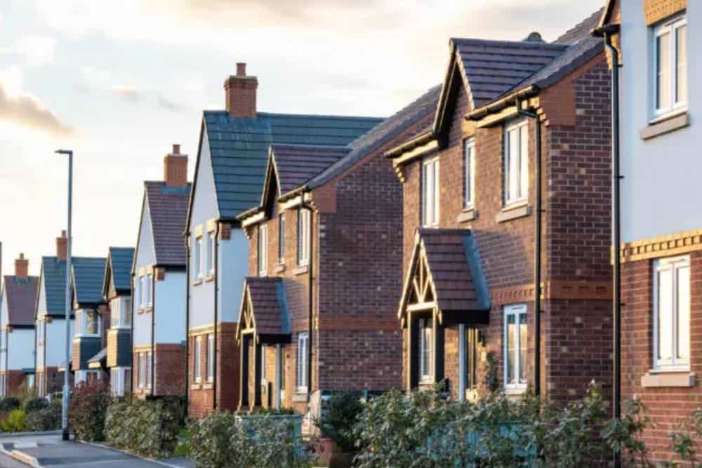 New suburban houses in the UK at dusk.