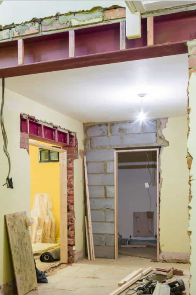 House interior during renovation with exposed structures.