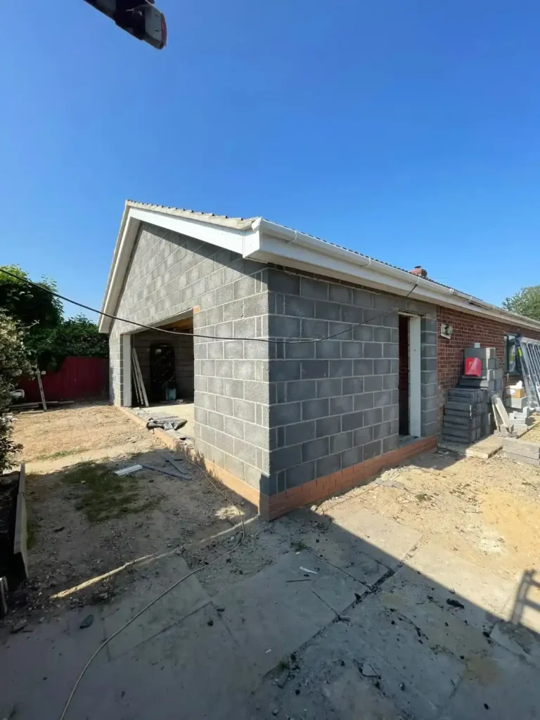 Home Extensions in King’s Lynn showing new blockwork, a pitched roof and white guttering.